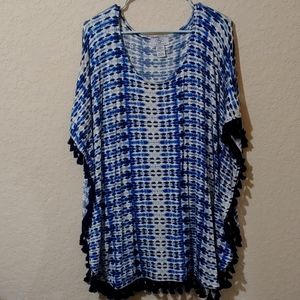 Poncho with built in tank